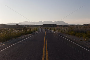 Highway through arid landscape