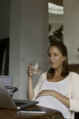 Pregnant woman hydrating