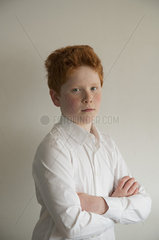 Boy with arms folded  portrait