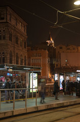 Istanbul  Tuerkei  Strassenbahnhaltestelle Karakoey  im Hintergrund der Galataturm