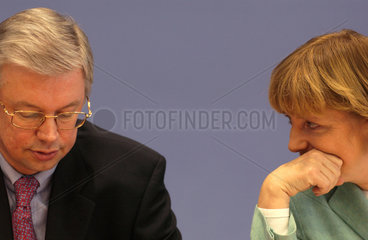 Roland Koch und Dr. Angela Merkel