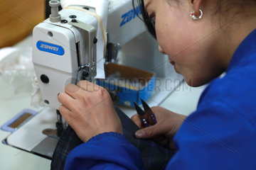CHINA-DONGXIANG-POVERTY ALLEVIATION WORKSHOPS (CN)