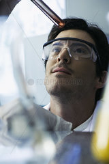 Scientist conducting experiment in laboratory