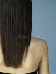 Brunette with long hair  rear view