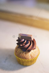 Cupcake with chocolate frosting