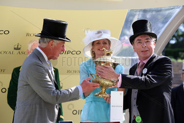 Royal Ascot  Prince Charles (left) gives the trophy to owner Sir Andrew Lloyd Webber after The Fugue with William Buick won the Prince of Wales's Stakes