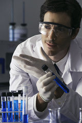 Scientist conducting experiment in lab