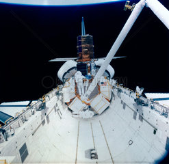 Shuttle astronaut with Solar Maximum Satellite  1984.