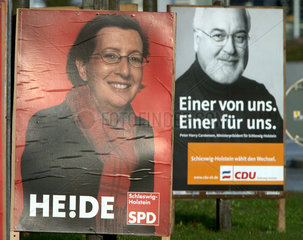 Wahlplakate in Kiel von SPD und CDU