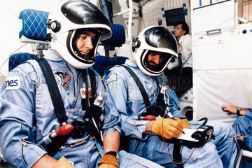Astronauts aboard Shuttle Discovery  1985.
