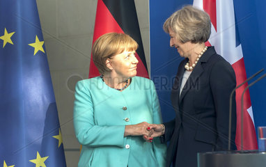 Merkel + May