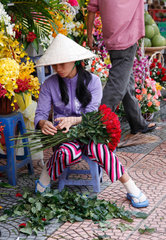 Ho-Chi-Minh-Stadt  Vietnam  Blumenfrau auf dem Markt