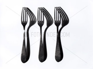 three forks and their shadows