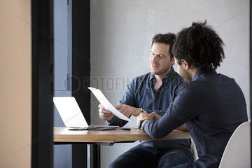 Man listening as document explained