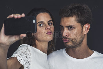 Couple posing for a selfie together