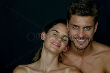 Happy couple with bare shoulders  portrait