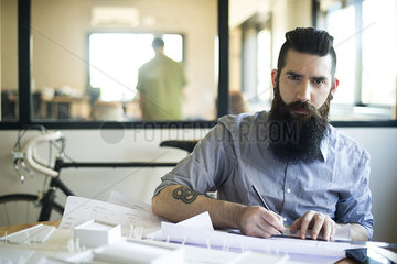 Architect working in office  portrait