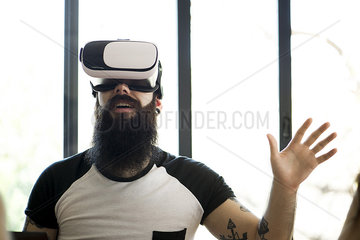 Man using virtual reality simulator