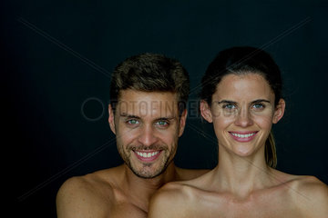 Couple smiling cheerfully  portrait