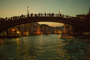Tourists visit the Accademia Bridge (Ponte dell'Academia) on the Grand Canal  Venice  Italy