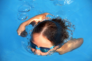Cala d'Or  Kind beim Schwimmen