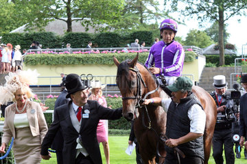 Royal Ascot  Hootenanny with Victor Espinoza up and the owners Gaye and Derrick Smith after winning the Windsor Castle Stakes