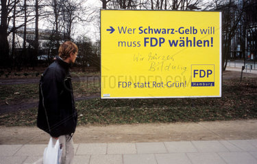 Werbeplakat der FDP mit ironischem Zusatz