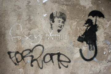 Berlin  Graffiti an einer Hauswand