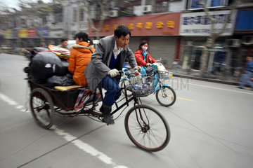 Shanghai  Rikschafahrer