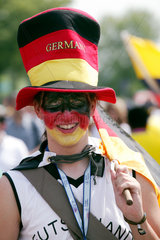 Berlin  deutscher Fussballfan mit bemaltem Gesicht