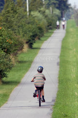Bad Doberan  Kind faehrt auf einem Fahrrad