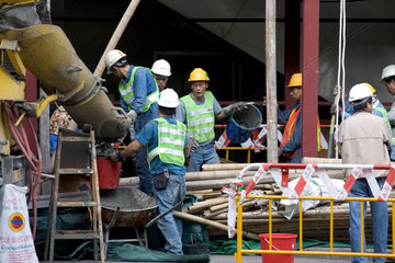 Hong Kong  Bauarbeiter auf einer Baustelle