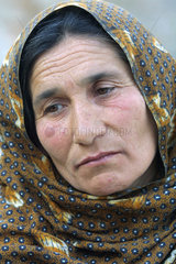 Resignierter Blick einer Frau in Kabul.