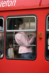 Polen  Krakau  Frau in der Strassenbahn