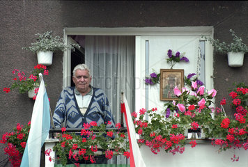 Renter auf Balkon  Fronleichnamsfest in Poznan  Polen