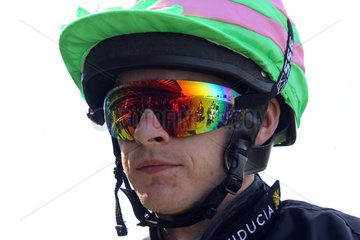 Royal Ascot  the track mirrored in the glasses of a jockey