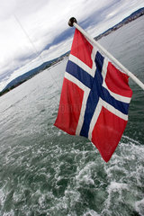 Norwegische Flagge am Heck eines Schiffes