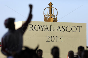 Royal Ascot  Silhouetted jockey in front of the shield Royal Ascot 2014