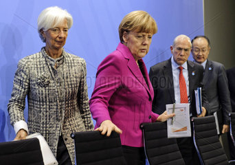 Lagarde + Merkel + Gurria + Yong Kim