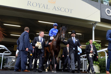 Royal Ascot  Elite Army with Kieren Fallon up and trainer Saeed bin Suroor (right with top hat) after winning the King George V Stakes