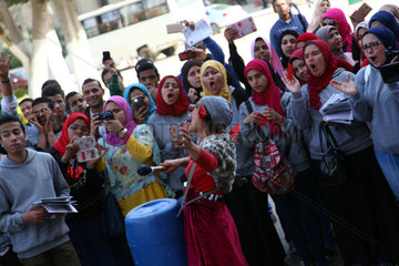 EGYPT-CAIRO-THE CAIRO UNIVERSITY-INT'L WOMEN'S DAY-DEMONSTRATION