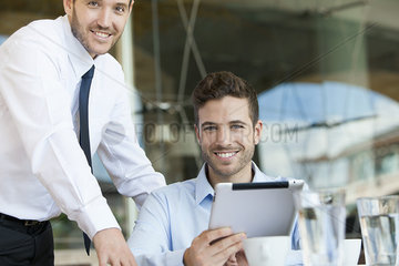 Business partners working together on digital tablet
