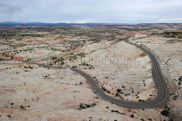 Paved road through desert landscape
