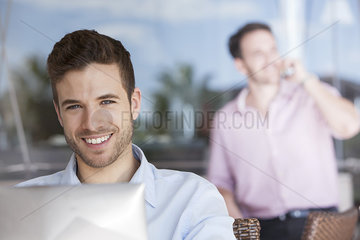 Businessman using laptop computer