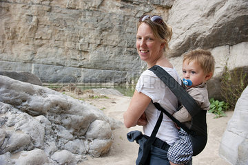 Woman hiking with young son at Big Bend National Park  Texas  USA