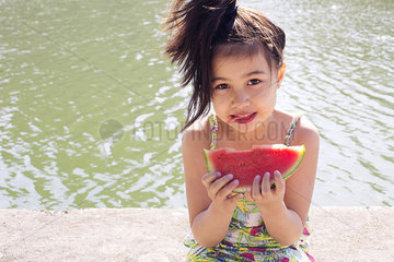 Girl eating watermelon  portrait