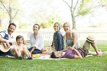 Friends relaxing together in the park