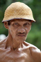 Kampuang Bukik catiak Tawang  Indonesien  Portraet eines Mannes
