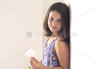 Girl holding rose  portrait