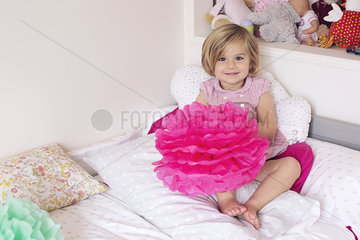 Little girl in her bedroom